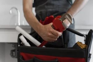 front-view-man-working-as-plumber - POLBUD Grzegorz Kosiorek