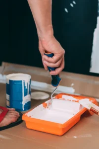 man-hands-painting-with-roller - POLBUD Grzegorz Kosiorek